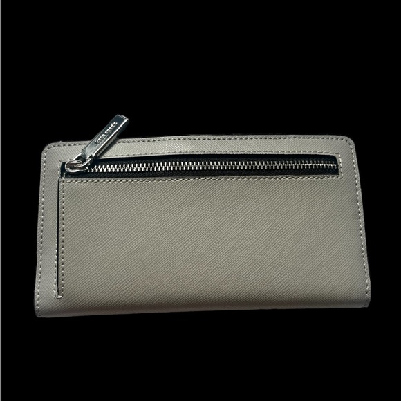 Kate Spade Staci Large Slim Bifold Wallet
Nimbus Grey/White - Picture 3 of 4